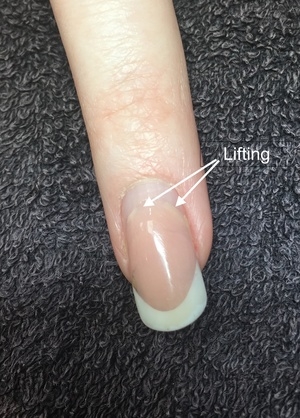 How to correctly remove nail enhancements that are lifting - Scratch  Magazine