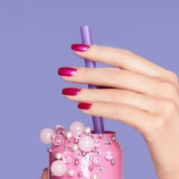 Pink nails. woman with soda can in hands