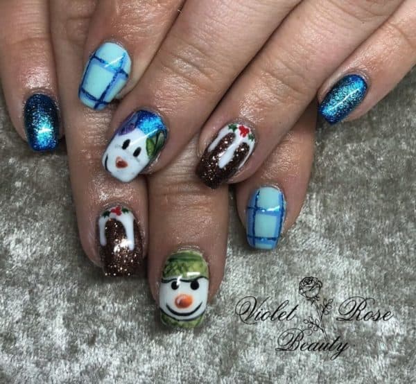 The Snowman and The Snowdog design by Victoria Popham
