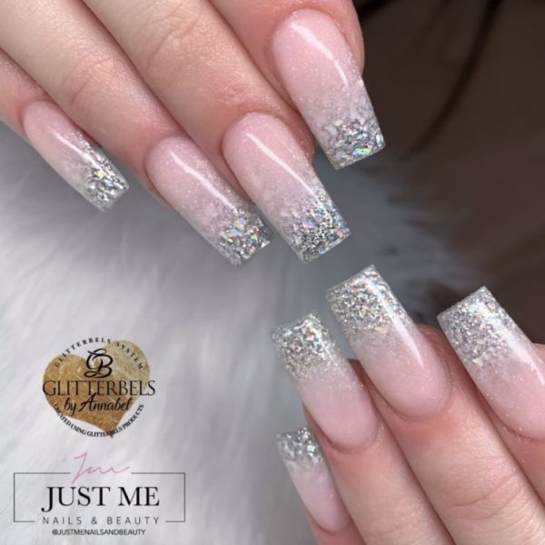 Sparkling silver tips by @justmenailsandbeauty