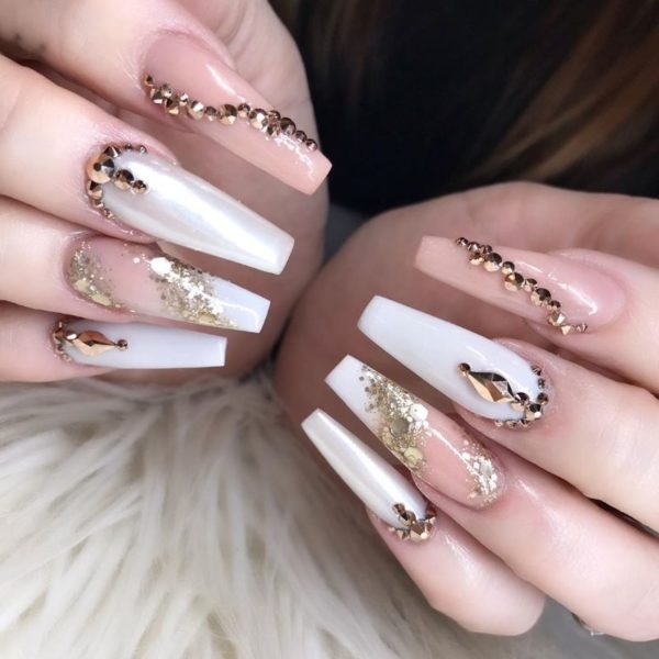 Georgia Wheeler combines luxe gold tones with pearly white for this decadent design 