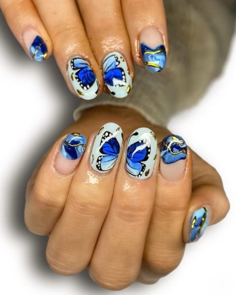 Lucy Barnett combines blue hues and a butterfly in this look