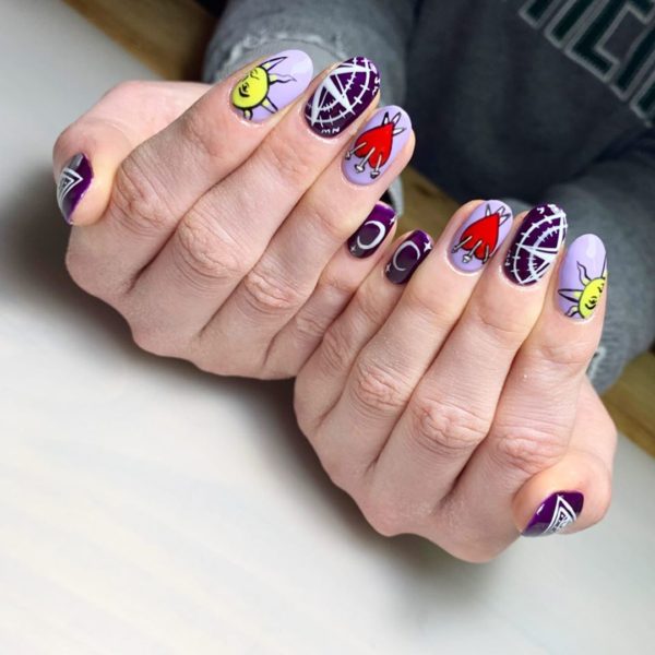 @glossnailsbybillie created these tarot inspired details