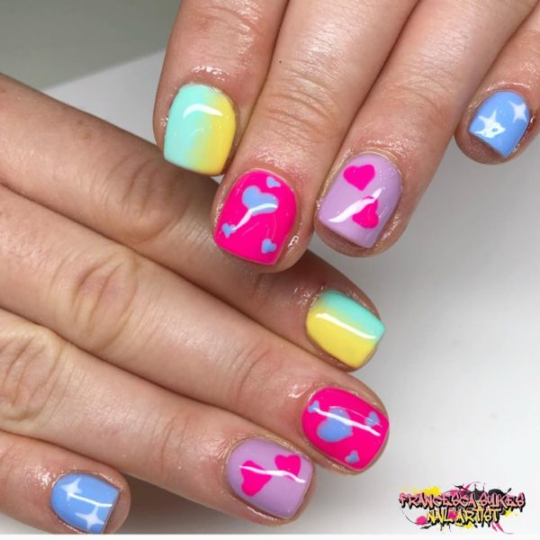 @francesca_sykes_nail_artist_ created this bold, colourful look