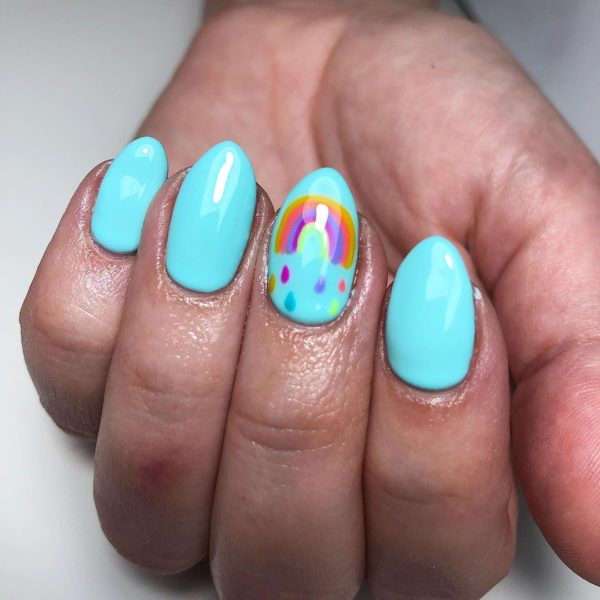 @thebeautiquebyelizabeth adds a statement rainbow nail