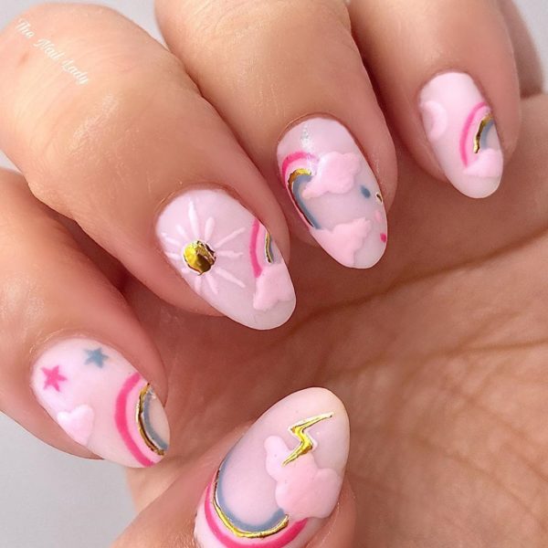 @thenailladylincoln adds pops of pink to this design