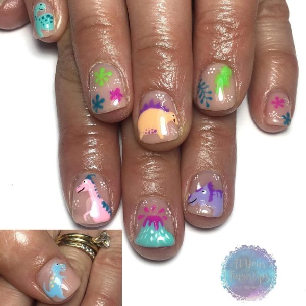 @atyourfingertipshanmer created this dino inspired mani