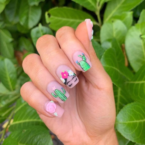 @jark.nails was inspired by Frida Kahlo for this nail look