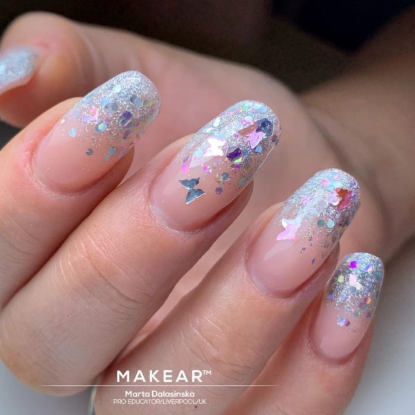 @miss_m.nails_liverpool adds a smattering of sparkle to complete this mani