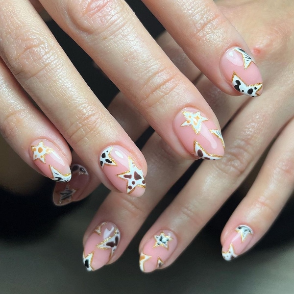 Negative Space Cow-Print Nail Art Is The Best Of Both Worlds
