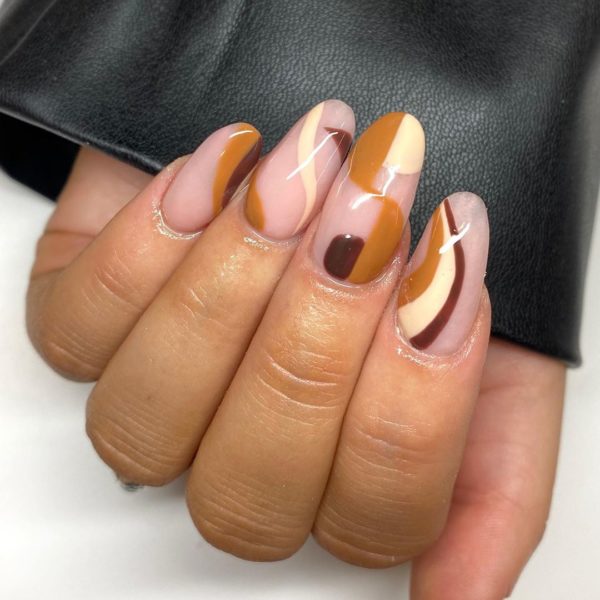 We love the autumnal shades used by Hannah Ross in this nail look