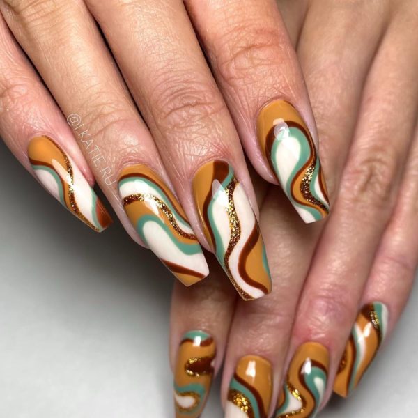 Katie Ru swirls together the colours of autumn in this marbled design 