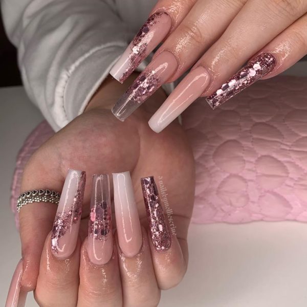 Pink glitter makes a serious statement in this nail look by Mollie Scrine 