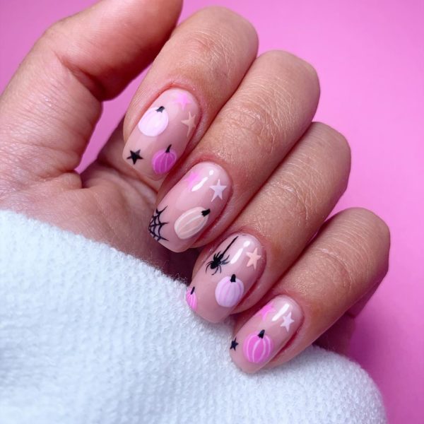 @naileditbeauty gets in the spirit for halloween with this pink pumpkin design 