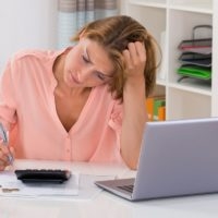 Woman Finances Stressed Money
