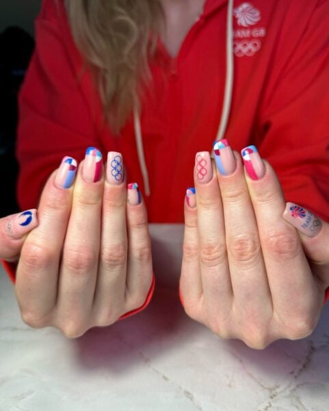 Nails by @1908.nails, aka Team GB swimmer, Keanna MacInnes, for her visit to the Paris Olympics.