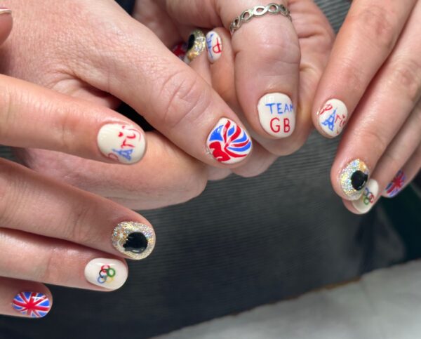 Lucy Price-Marshall and Jessica Price of Nailspa created these matching styles for GB equestrian, Becky Moody, and groom, Kim, for the 2024 Games. They nod to the horse Becky is riding, Jagerbomb.