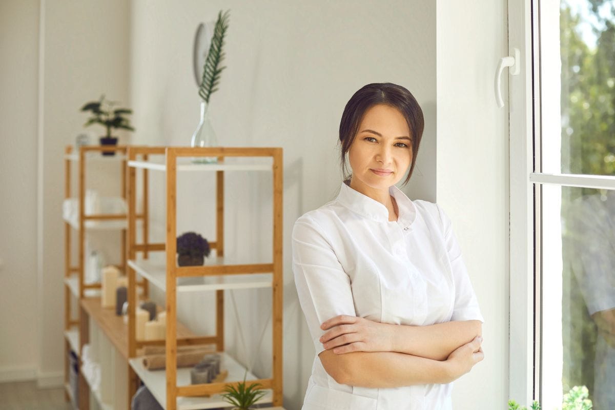 Beauty Therapist Standing Window Salon