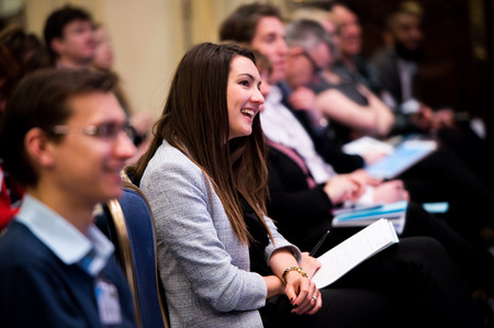 Beauty trends innovations conference woman in audience