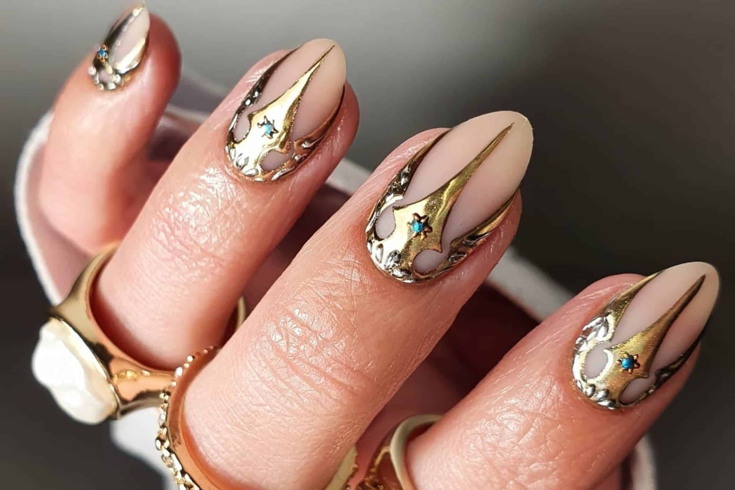 The Odyssey Greek-inspired nail designs lead image courtesy of Instagram.com/rebekahxpritchard