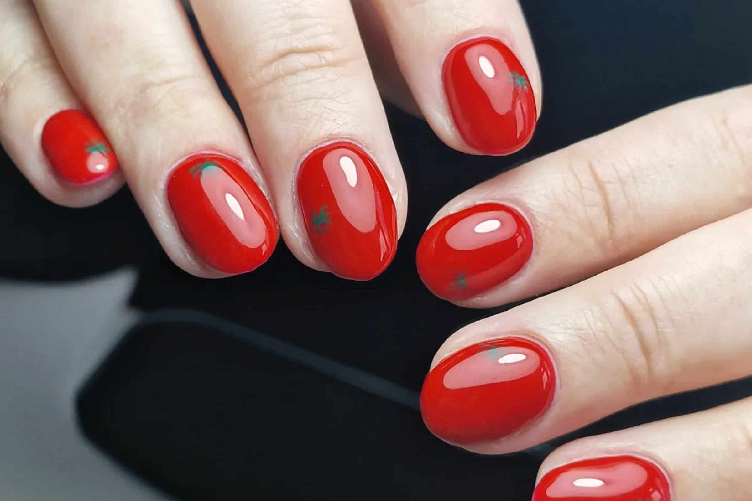Tomato nail trend lead image courtesy of Instagram.com/nailedbyclare