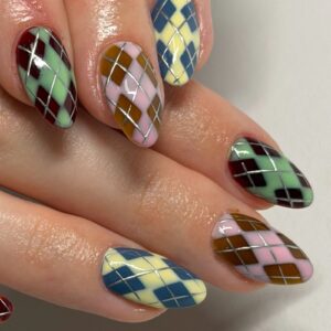 Colourful argyle nail art with silver criss-cross lines