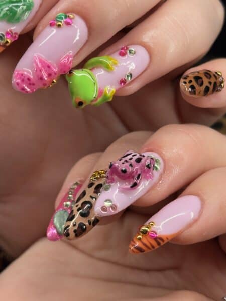 Colourful frog and leopard print rhinestone nail art