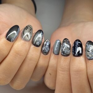 Grey and black nails with white floral artwork
