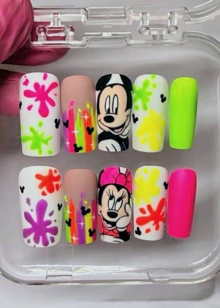 Colourful Disney character nail art samples in clear case