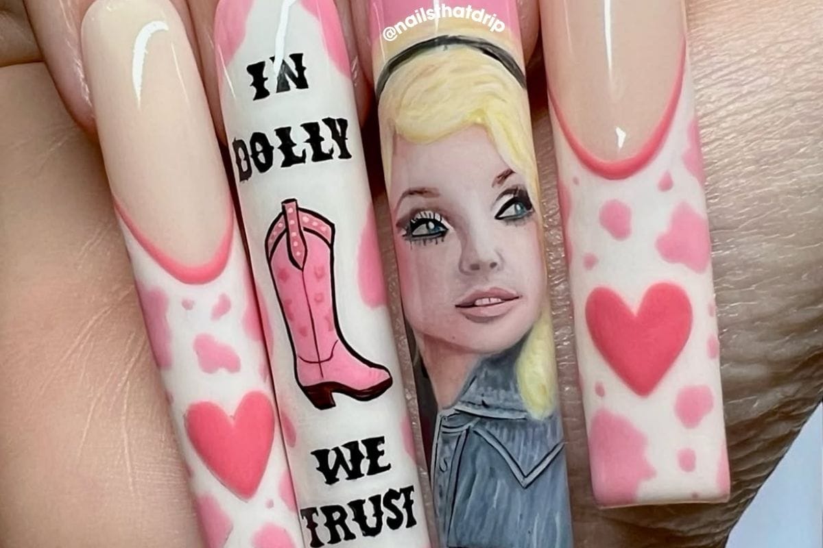 Barbie-inspired pink nail art with portrait and cowboy boot