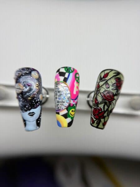 Close-up of colourful bracelets on a white display stand