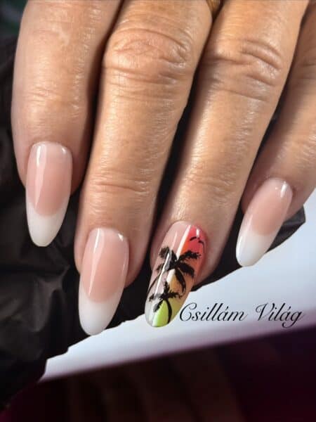 French ombré nails with tropical palm tree accent