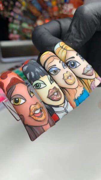 Cartoon portrait nail art on long acrylic nails