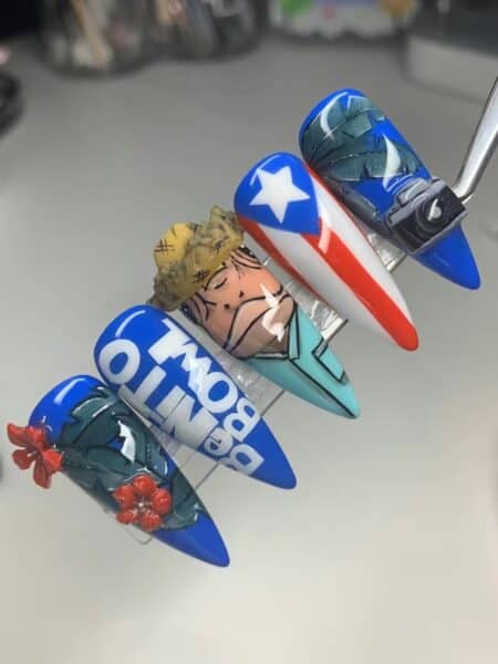 Superhero-themed blue acrylic nail art display
