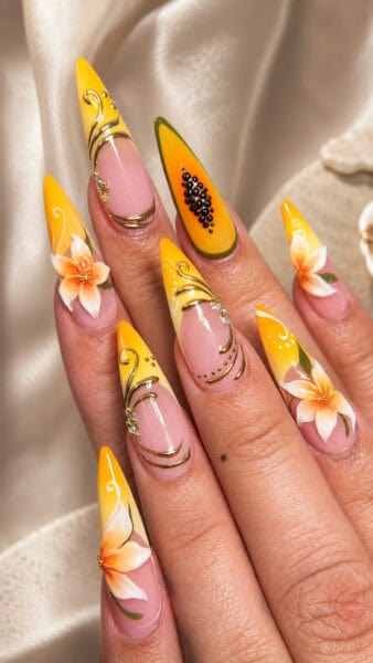 Yellow floral stiletto nails with gold detailing