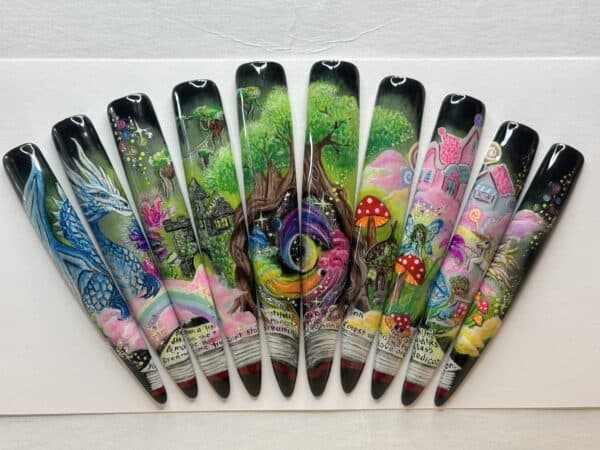 Fantasy forest nail art with dragon, castle and mushrooms
