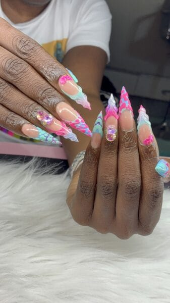 Colourful 3D stiletto acrylic nails with rhinestones
