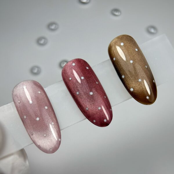 Metallic pink, burgundy and bronze polka-dot nail art