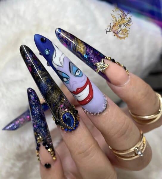 Ursula-inspired purple stiletto nails with glitter and jewels
