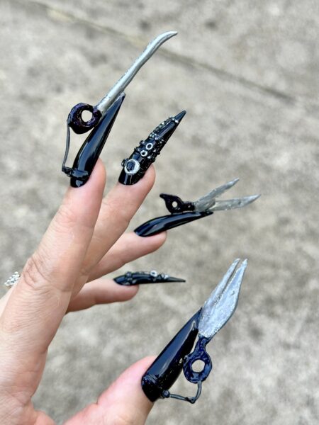 Black nails with silver gothic spike embellishments