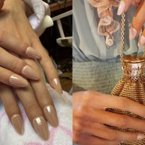 Glossy nude almond nails beside gold jewellery