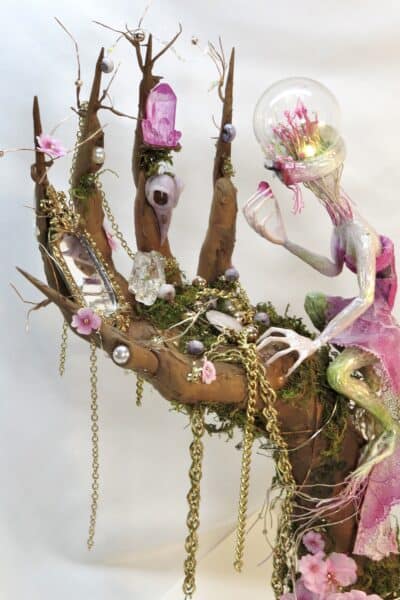 Enchanted fairy tree with crystals, flowers and glowing orb