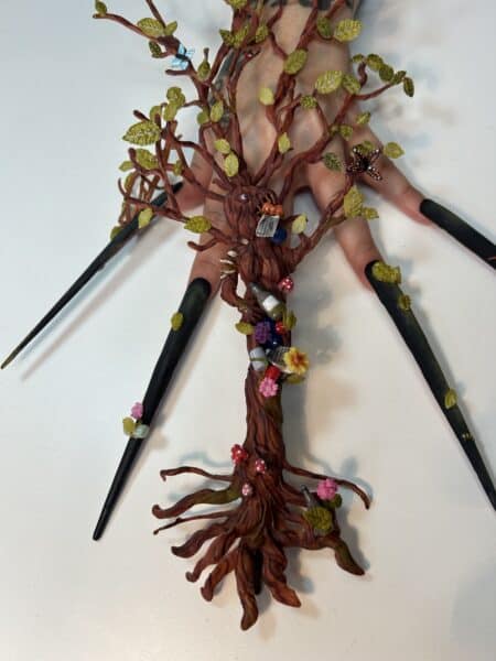 Decorative miniature tree sculpture with butterflies, flowers and mushrooms