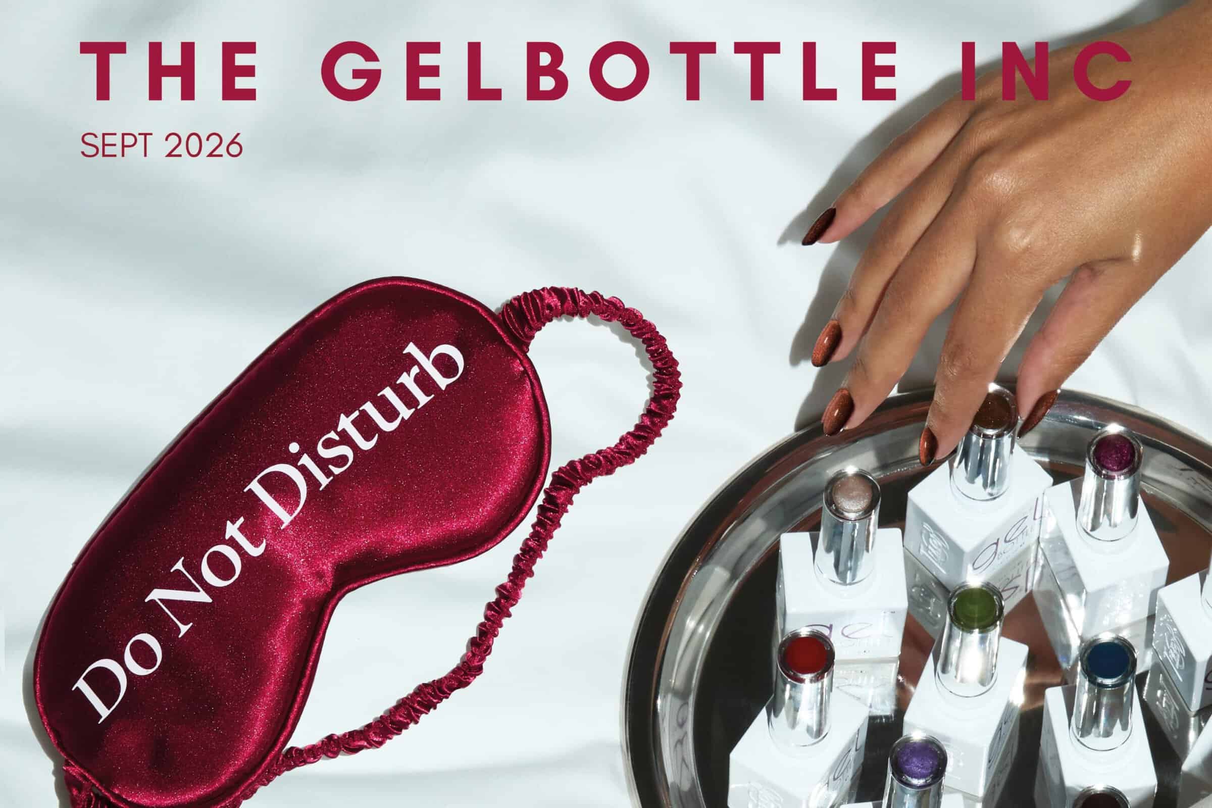 Gel polish bottles, burgundy mask and manicured hand