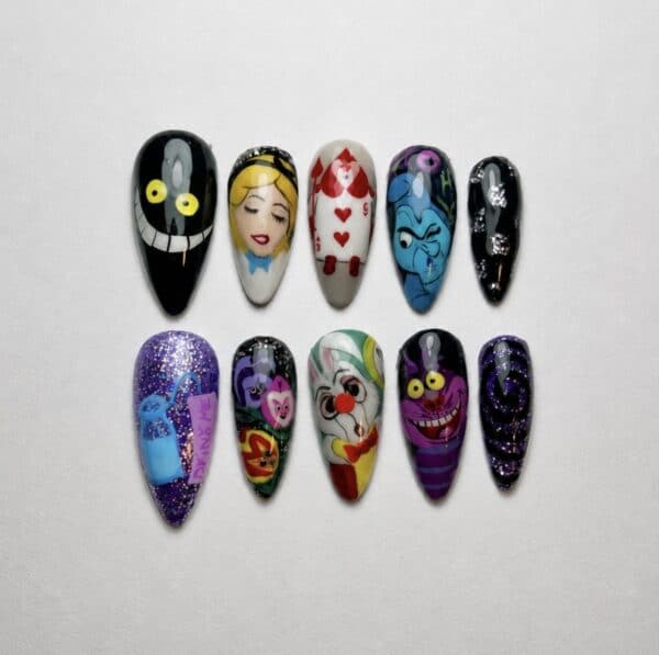 Ten hand-painted Alice in Wonderland themed nail art tips