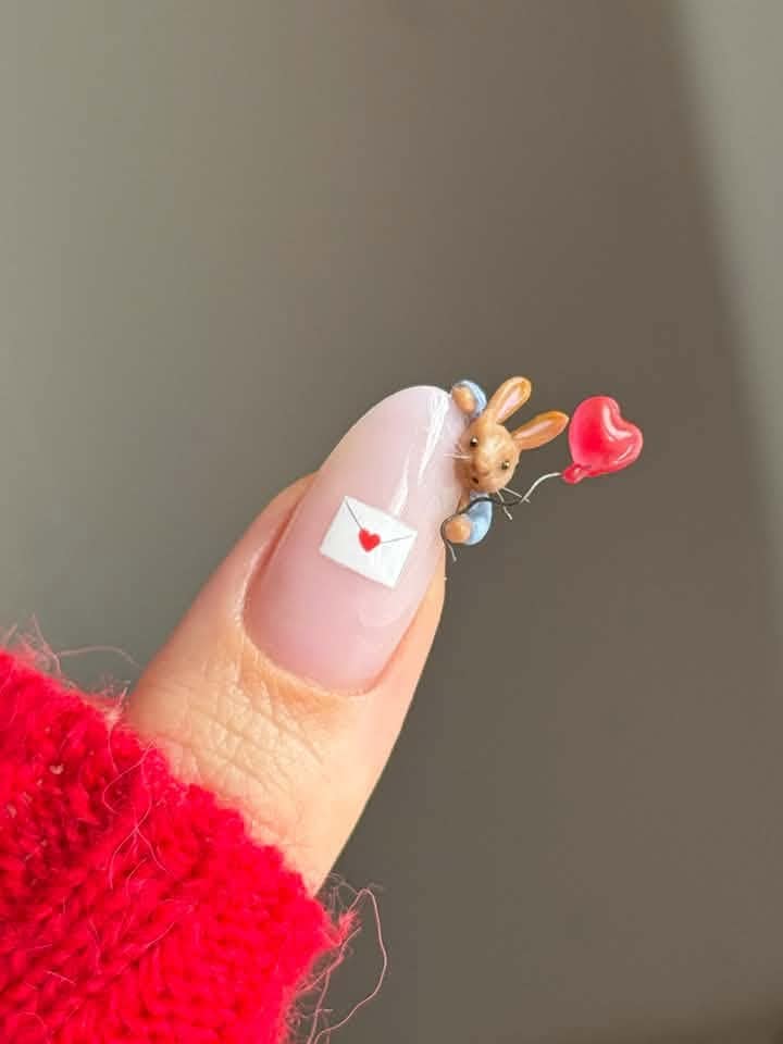 Rabbit nail art holding heart balloon and love letter