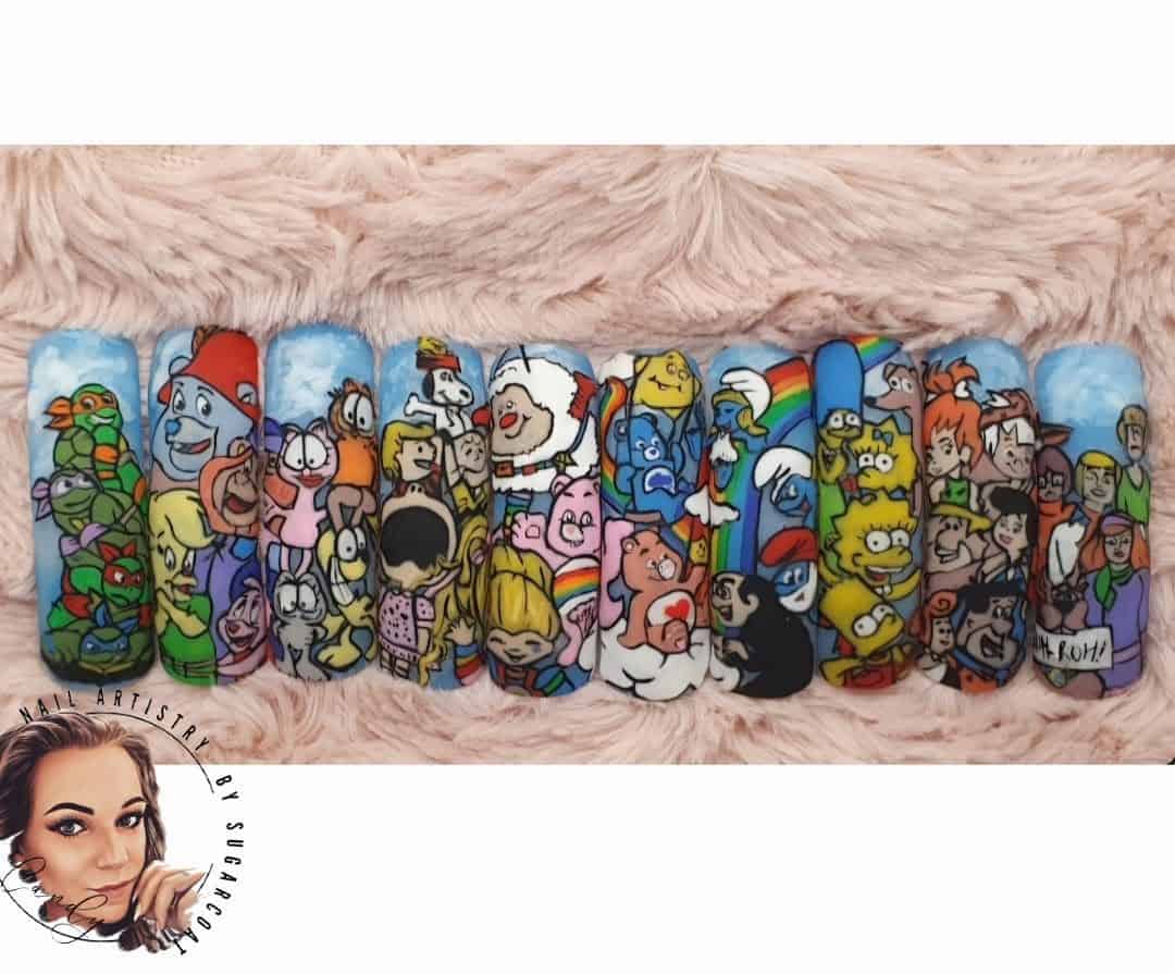 Cartoon character nail art on colourful blue manicure tips