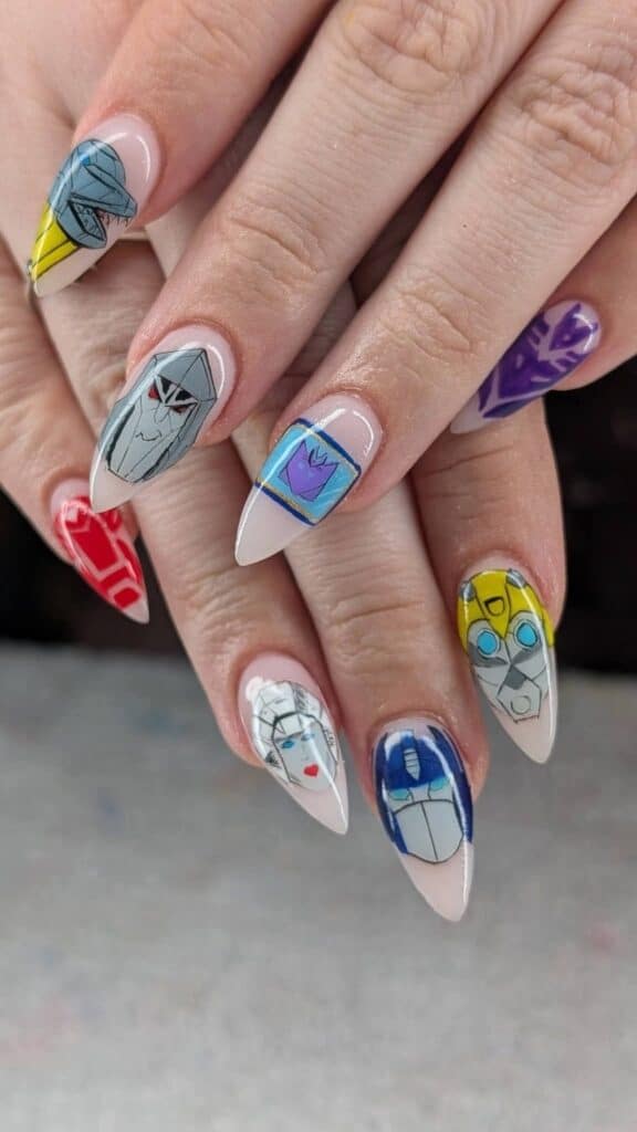 Pointed nails with colourful Transformers character nail art