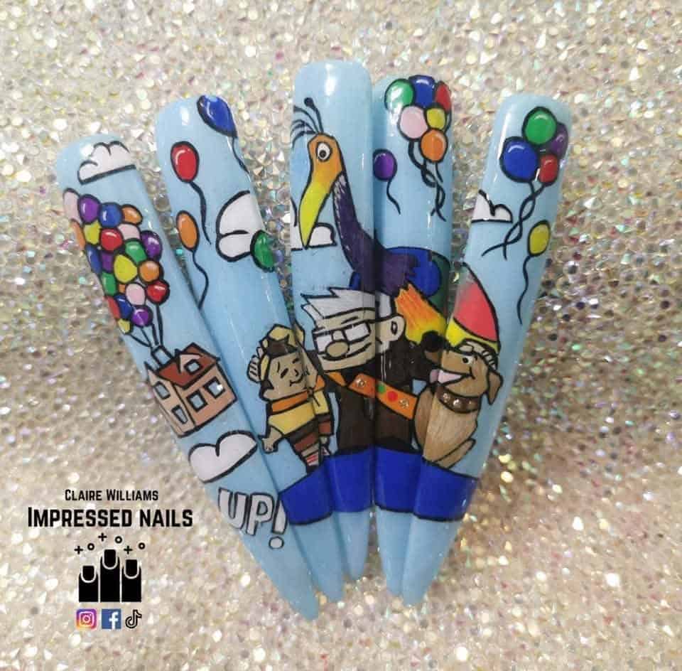 Up-inspired hand-painted blue nail art with balloons