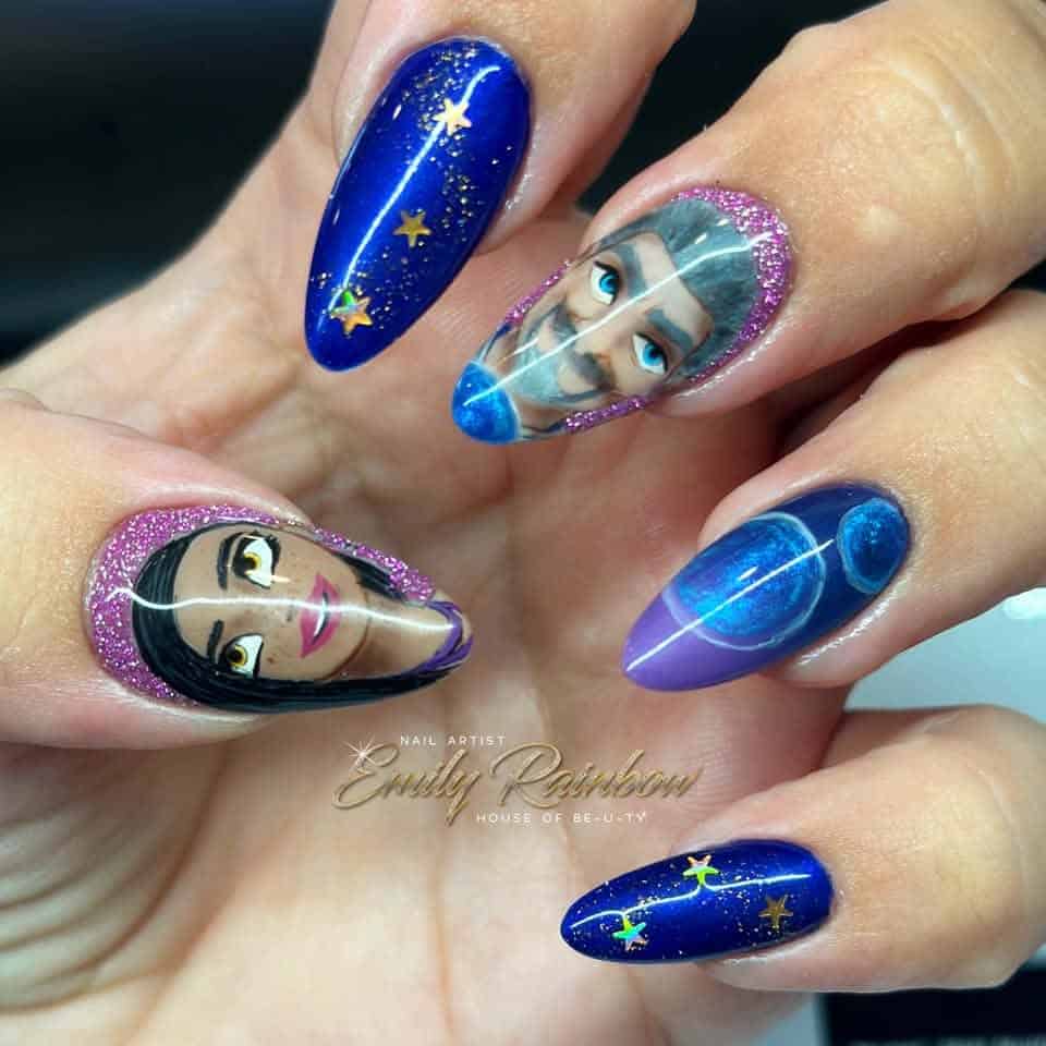 Aladdin-inspired blue glitter nail art with character portraits